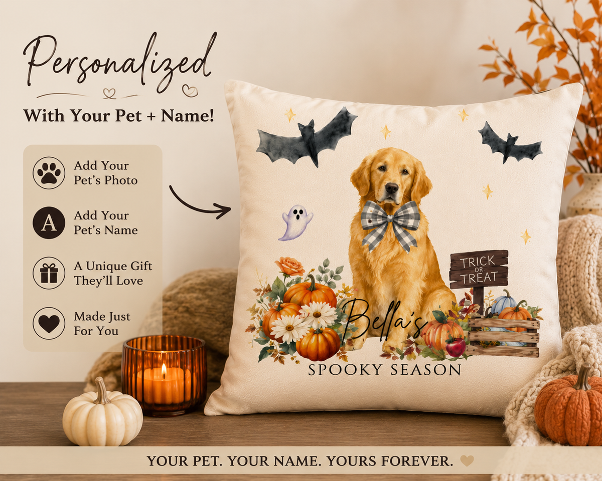 A personalized cream-colored throw pillow featuring a golden retriever dog with a plaid bow tie, surrounded by pumpkins, autumn leaves, bats, and the text 'Bella's Spooky Season'. The pillow is displayed in a cozy home setting with a lit candle, a small pumpkin, and knitted blankets, alongside informational text overlays on the left detailing personalization options.